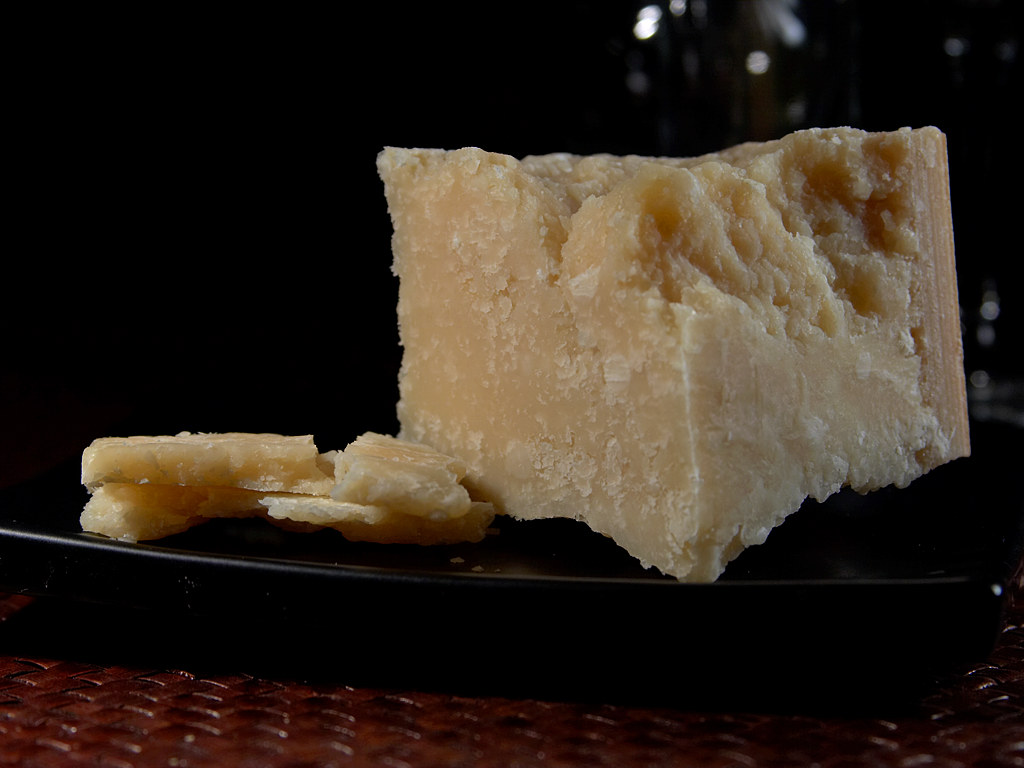 A wedge of Parmigiano Reggiano